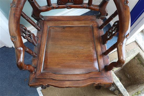 A pair of early 20th century Chinese Hongmu elbow chairs